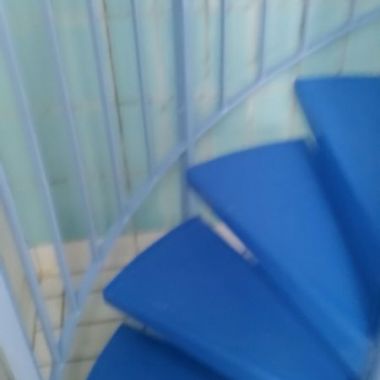Rénovation des marches en résine pour escalier colimaçon